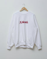 製品染めフロッキープリントスウェットクルーネック